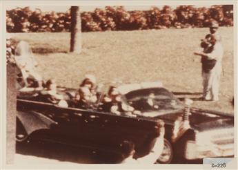 (ZAPRUDER FILM--JFK) A series of 36 film stills and 40 color slides from the Zapruder Film of President Kennedys assassination.